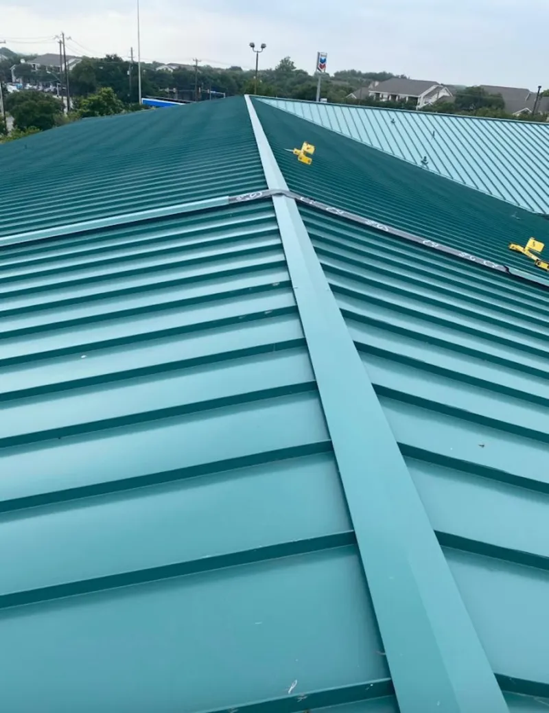 Green commercial metal roof ridge and valley for Metal Roof Repair in Gunbarrel